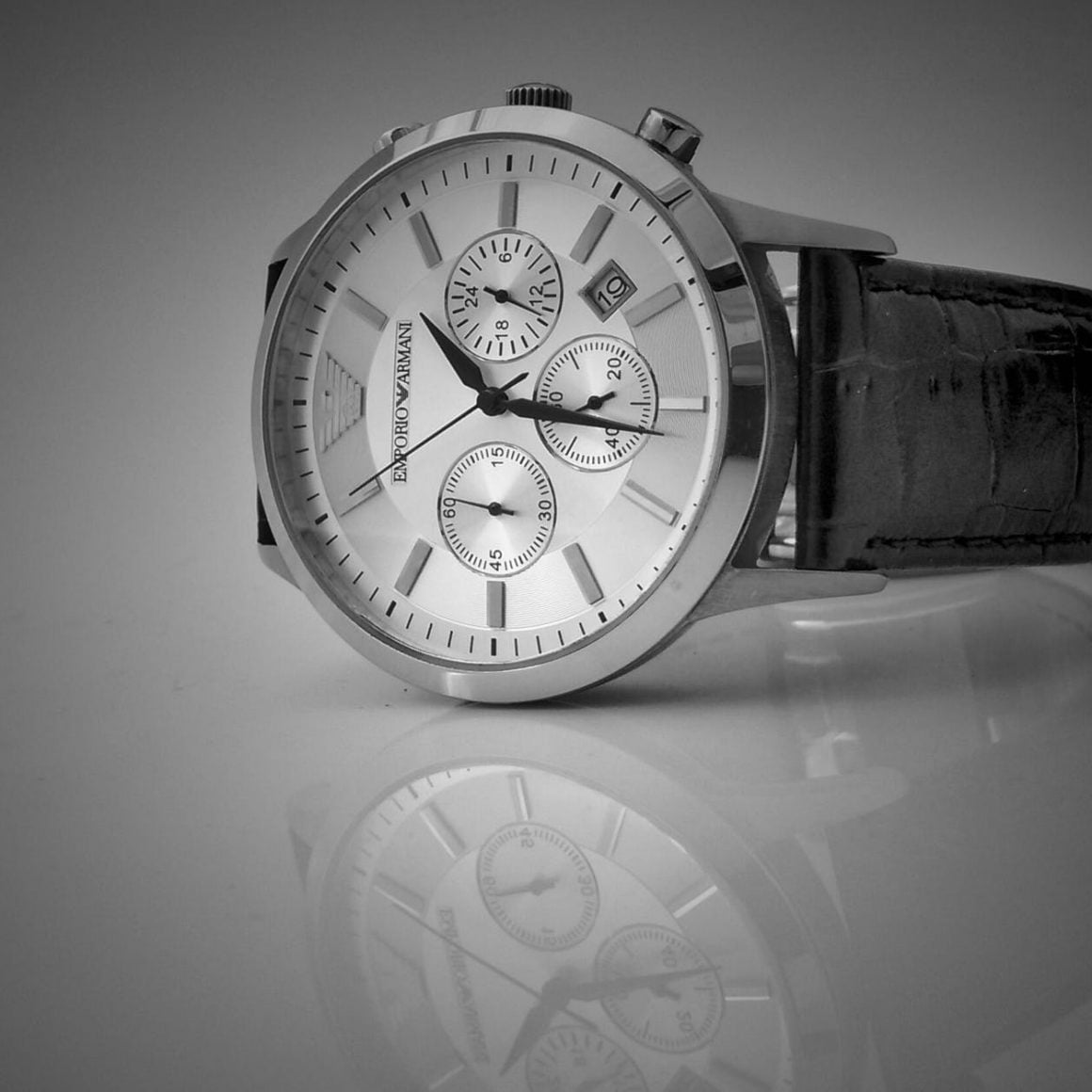 black leather strap silver chronograph watch