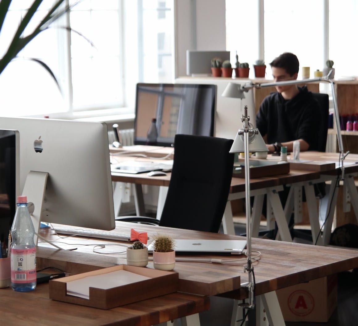 man sitting in front of computer