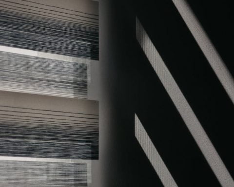 a window with roller blinds